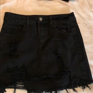 Black distressed mini skirt